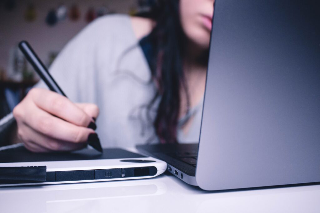 woman studying at computer. 
