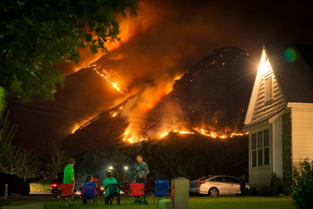 family watching wildfire from afar. 