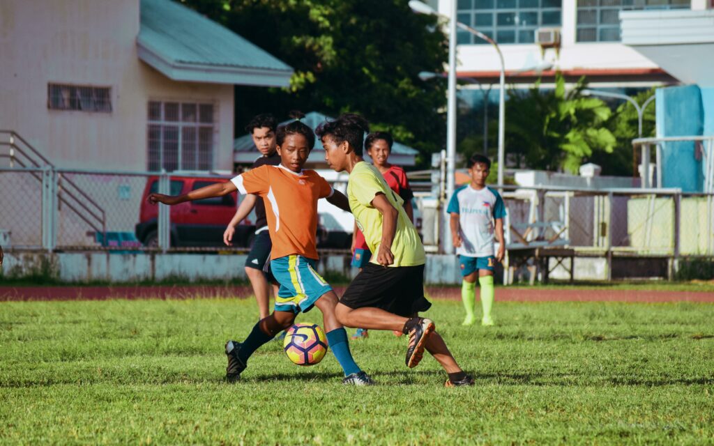 Boys playing soccer.